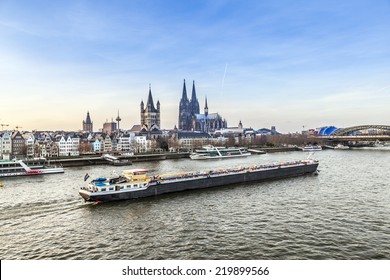 Sunrise In Cologne With Dome And River Rhine