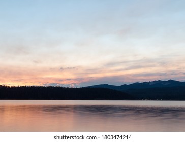 Sunrise At Diamond Lake In Southern Oregon.