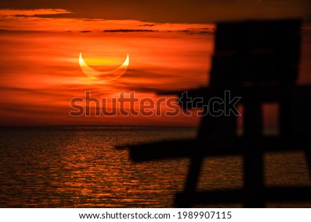 Sunrise eclipse in Cedar Beach, Mt Sinai, NY, on June 10, 2021