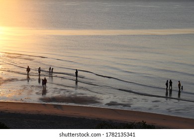 Sunrise in the golden sunlight morning with a happy moment and a fresh life at the sea shore. Bor Fai Beach, Hua Hin, Prachuap Khiri Khan, Thailand. July 5 2020.