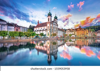 Sunrise in historic city center of Lucerne with famous Chapel Bridge and lake Lucerne (Vierwaldstattersee), Canton of Lucerne, Switzerland