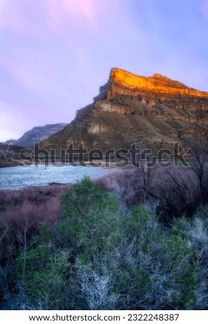 Sunrise at James M. Robb State park in Palisade Colorado. The Colorado River flows beneath the buttes in Debeque Canyon