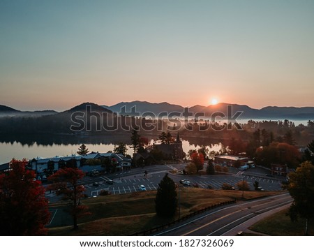 Sunrise at Lake Placid. Aerial view. Beautiful village with mountain and lake view.