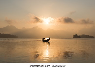 Sunrise Landscape With Silhouette Boat