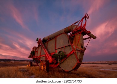 Sunrise Light On A Threshing Machine