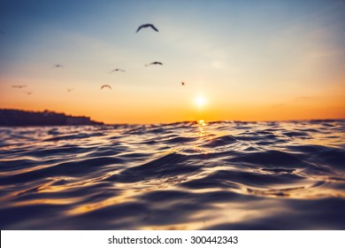 Sunrise Light Shining On Ocean Wave