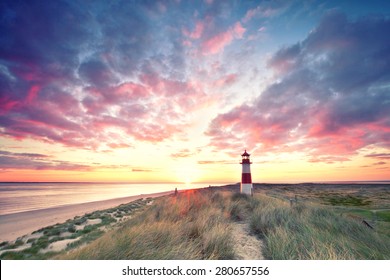 sunrise at Lighthouse List East on Sylt. - Powered by Shutterstock