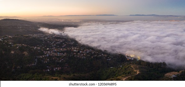 Sunrise Lights The Ever-present Offshore Marine Layer In The San Francisco Bay Area. The Marine Layer Is Propelled By A Pressure Gradient Which Develops Due To Warm Inland Temperatures.