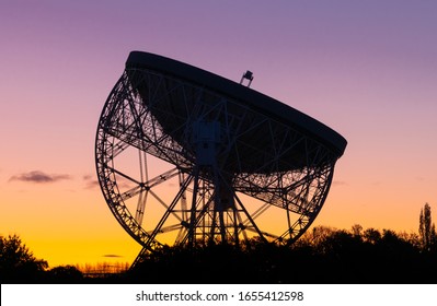 Sunrise at the Lovell Telescope at Jodrell Bank in the Cheshire landscape - a UNESCO World Heritage Site. Radio Telescope Centre for Astrophysics at the University of Manchester