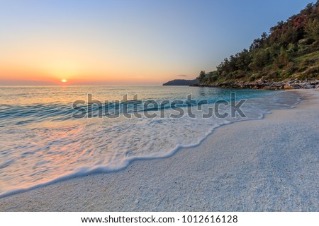 Sunrise in Marble beach (Saliara beach), Thassos Islands, Greece. The most beautiful white beach in Greece