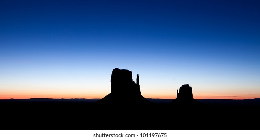 Sunrise In Monument Valley Arizona, With The Buttes In Silhouette
