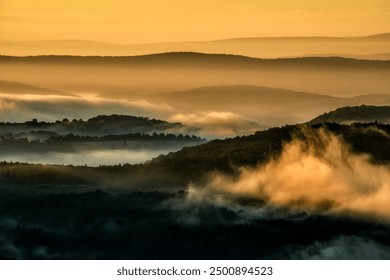 Sunrise morning mist along the Highland Scenic Highway, a National Scenic Byway in Pocahontas County, West Virginia, USA - Powered by Shutterstock