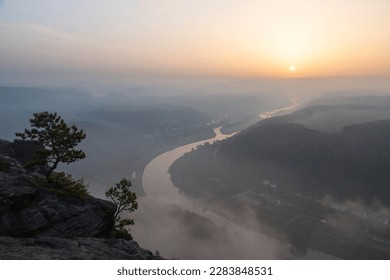 Sunrise, morning mist, view from Lilienstein to the Elbe in direction of Bad Schandau, Elbe Sandstone Mountains, Saxony, Germany - Shutterstock ID 2283848531