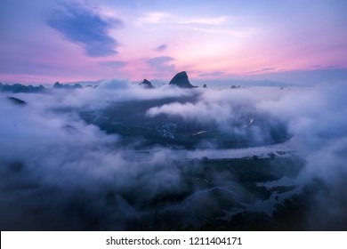 The sunrise of the mountain of Xinping, Gulin, China. 