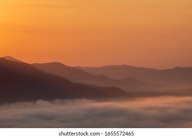 The sunrise with mountains and clouds - Powered by Shutterstock
