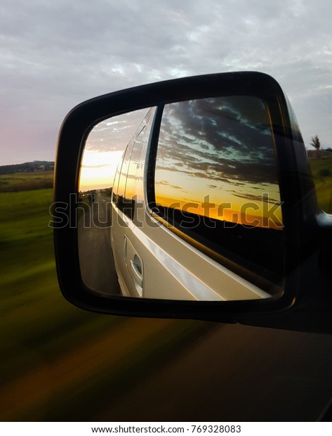 sunrise in my car\
mirror