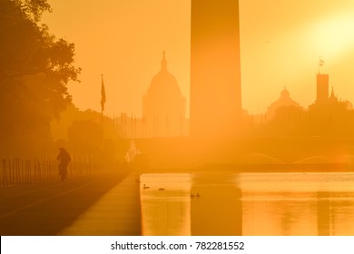 The sunrise in the national mall with a view of Washington Monument and capitol and reflection pool. -  Washington DC, United States