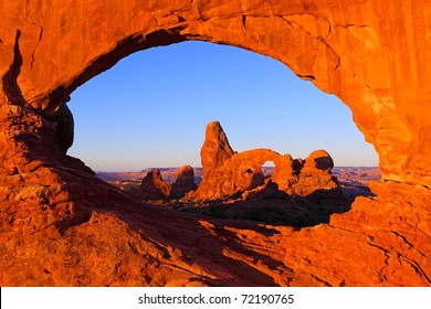 Sunrise On Arches In Arches National Park, Utah.