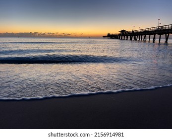 Sunrise On The Atlantic Ocean East Coast Of Florida With A Fishing Pier