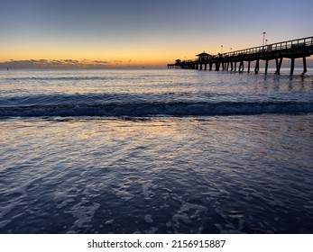 Sunrise On The Atlantic Ocean East Coast Of Florida With A Fishing Pier