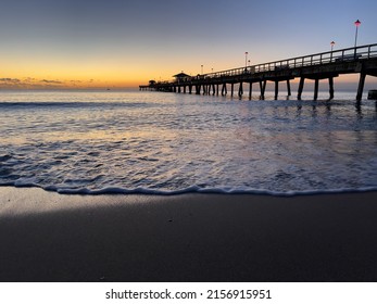 Sunrise On The Atlantic Ocean East Coast Of Florida With A Fishing Pier