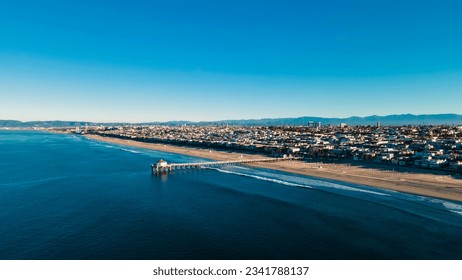 Sunrise on the beach in Mahattan Beach California - Shutterstock ID 2341788137