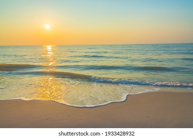 Sunrise on the beach - vintage filter.
Sea waves lash line impact rock on the bea.
Seaside under a rough sky.