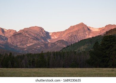 Sunrise On Flattop Mountain, Hallet Peak, And Otis Peak In Rocky Mountain National Park.