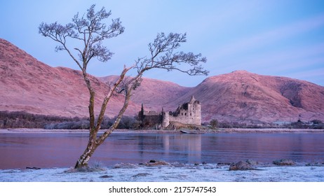 Sunrise On A Frosty Winter Morning With Reflections Of Kilchurn Castle In Loch Awe, Highlands, Scotland