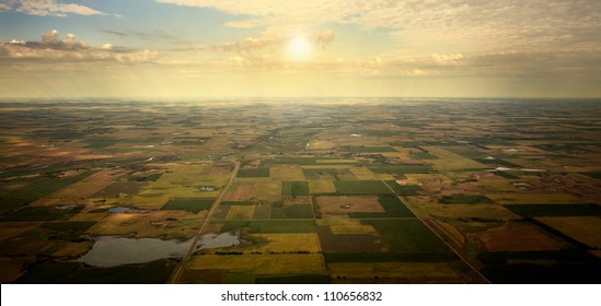 Sunrise On Horizon - Illustrated Sunrise Over An Aerial View Of South Dakota Farm Land