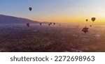 Sunrise on hot air balloon over the Teotihuacan pyramid