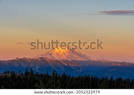 A sunrise on Mount Rainier and the Norse Peak Wilderness, Washington.