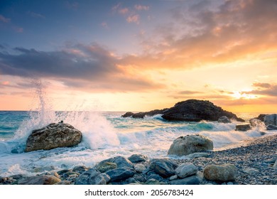 Sunrise on the sea - Sea wave crash on big stone in beautiful white splashes. Seascape. Panoramic view of the seashore - Powered by Shutterstock