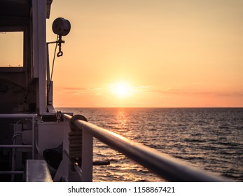 Sunrise from the open deck of cruise ship - Shutterstock ID 1158867421
