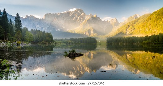 Sunrise over the beautiful alpine lake