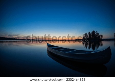 Sunrise over Big Gull Lake in Ontario, Canada. 