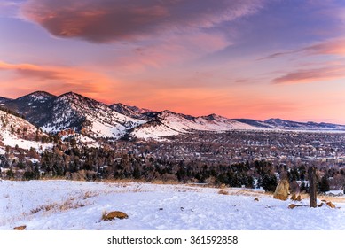 Sunrise over Boulder, Colorado in the wintery mountains.