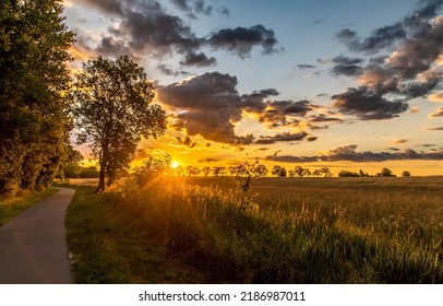 Sunrise over the countryside landscape. Countryside at dawn. Rural sunrise landscape. Nature at dawn