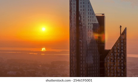 Sunrise over Dubai skyline in the morning, aerial top view to downtown city center landmarks timelapse. Famous viewpoint, foggy weather. United Arab Emirates - Powered by Shutterstock