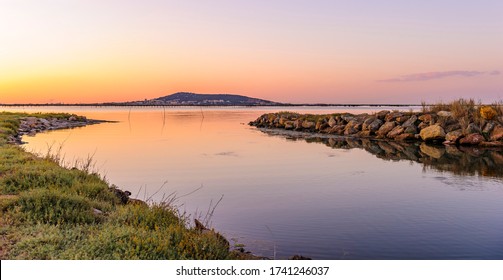 Sunrise Over The Etang De Thau And Mont Saint Clair In The Background In Hérault In Occitania, France