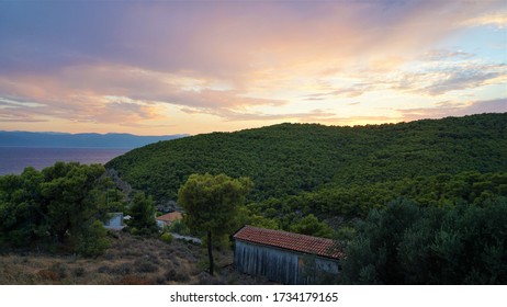 Sunrise Over Forest Topped Mountain In Porto Heli Greece