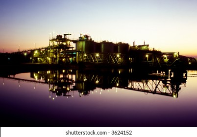 Sunrise Over Gold Mine Processing Plant And Tailings Dam