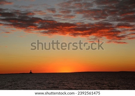 Sunrise over Lake Superior in Fall with clouds