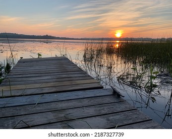 Sunrise Over A Maine Lake