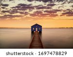 Sunrise over the Matilda Bay boathouse in the Swan River in Perth, Western Australia.