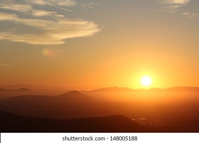 Sunrise over the Mountains - Fiery daybreak over the foothills of the Sierra Madre Occidental range near Mazatlan, Mexico - Powered by Shutterstock