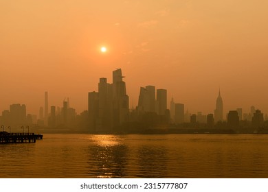 Sunrise over NYC during Canadian Wildfire Smoke Event, from Hoboken NJ - Powered by Shutterstock