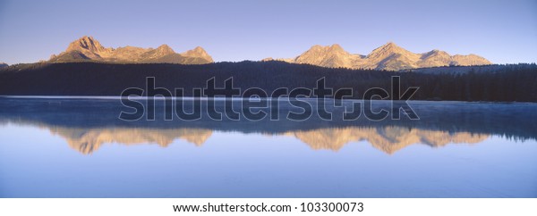 Sunrise\
over Redfish Lake and Sawtooth Mountains,\
Idaho