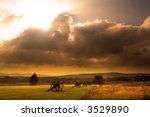 Sunrise over a row of cannon at the Antietam Civil War Battlefield at Sharpsburg, Maryland USA