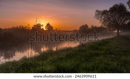 Similar – Morgens nebliger Fluss. Sommer nebliger Sonnenaufgang